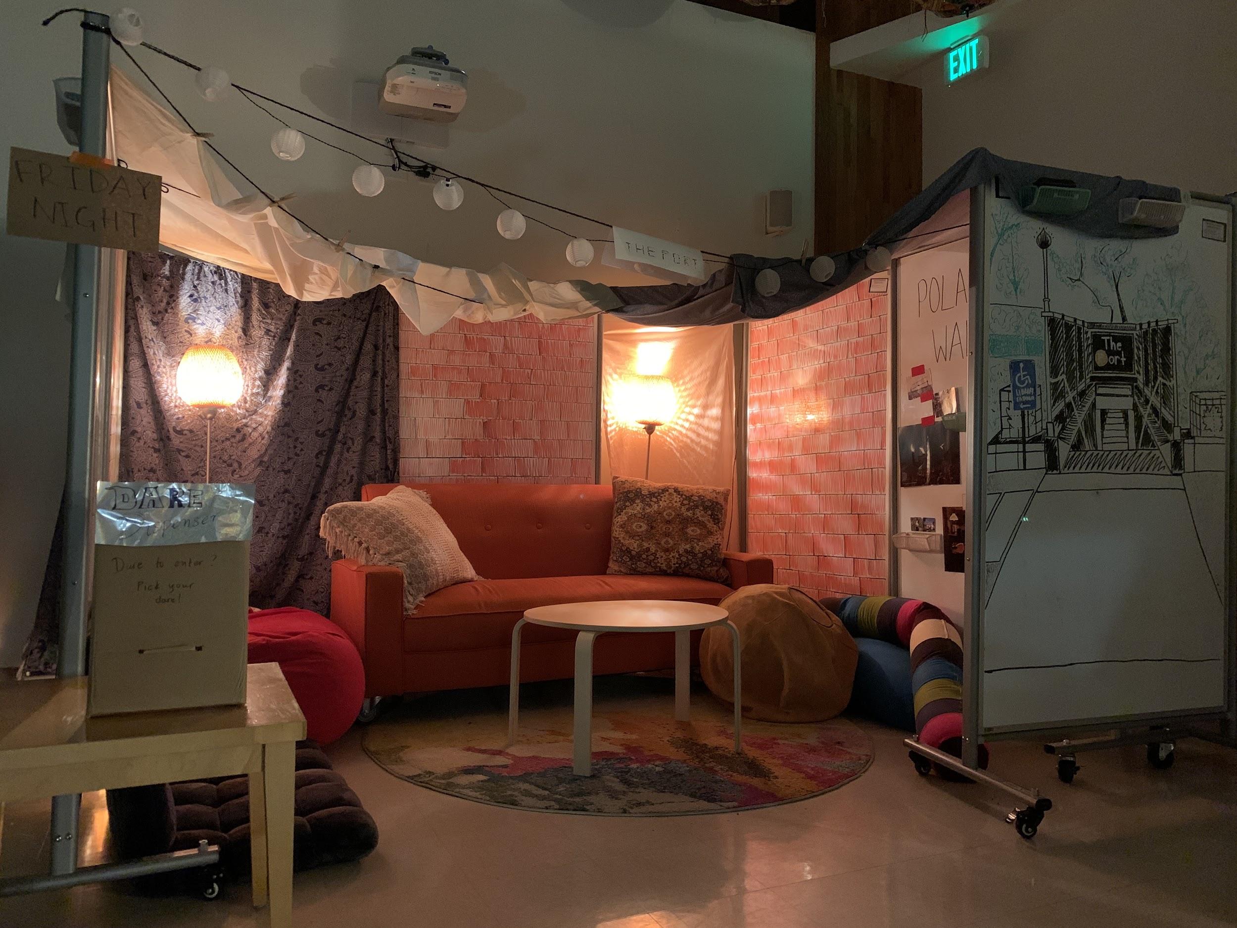 indoor low lighting fort with a couch and table